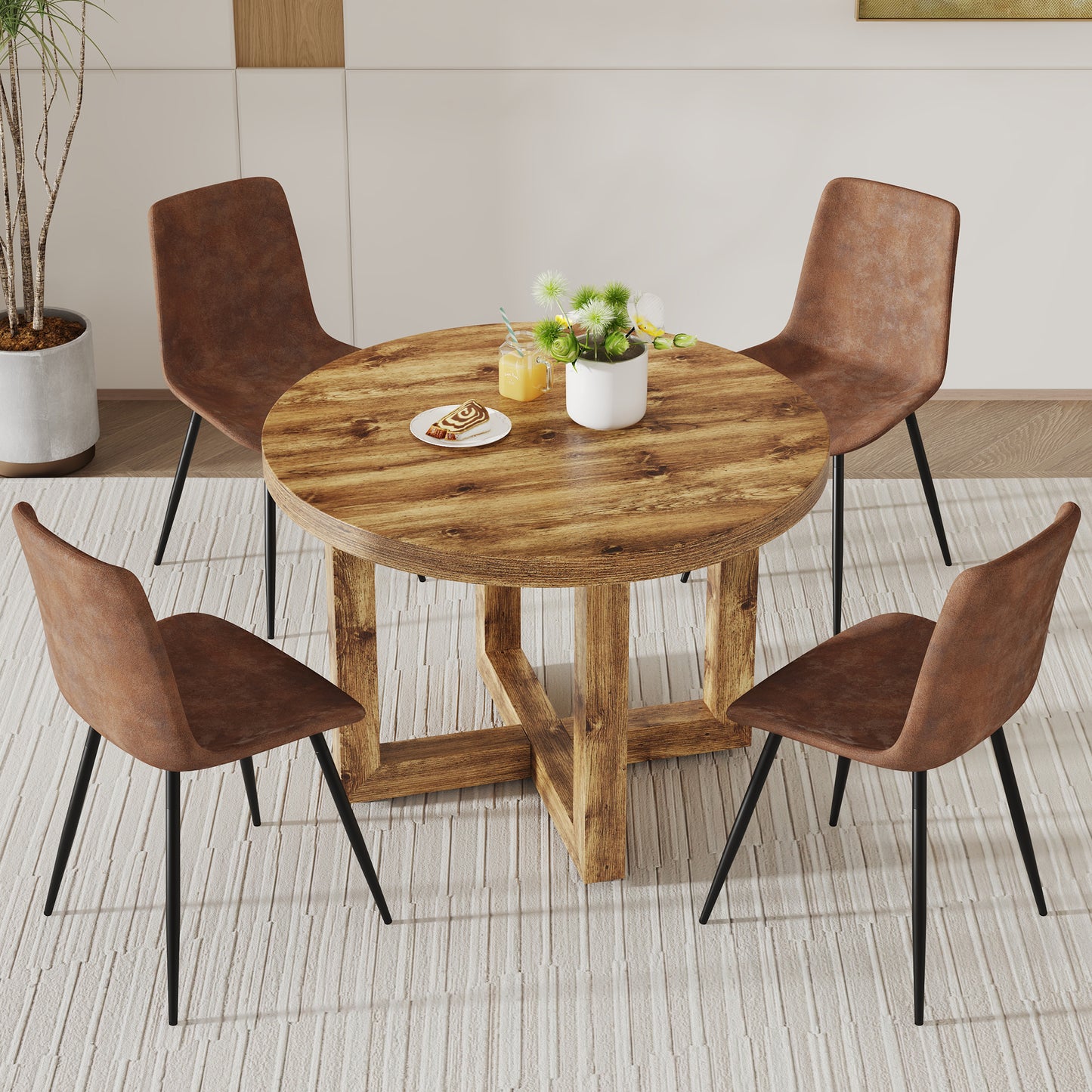 A modern and practical circular dining table. Made of MDF tabletop and wooden MDF table legs.A set of 4 brown cushioned chairs in a modern medieval style restaurant. CT-403 B0502A