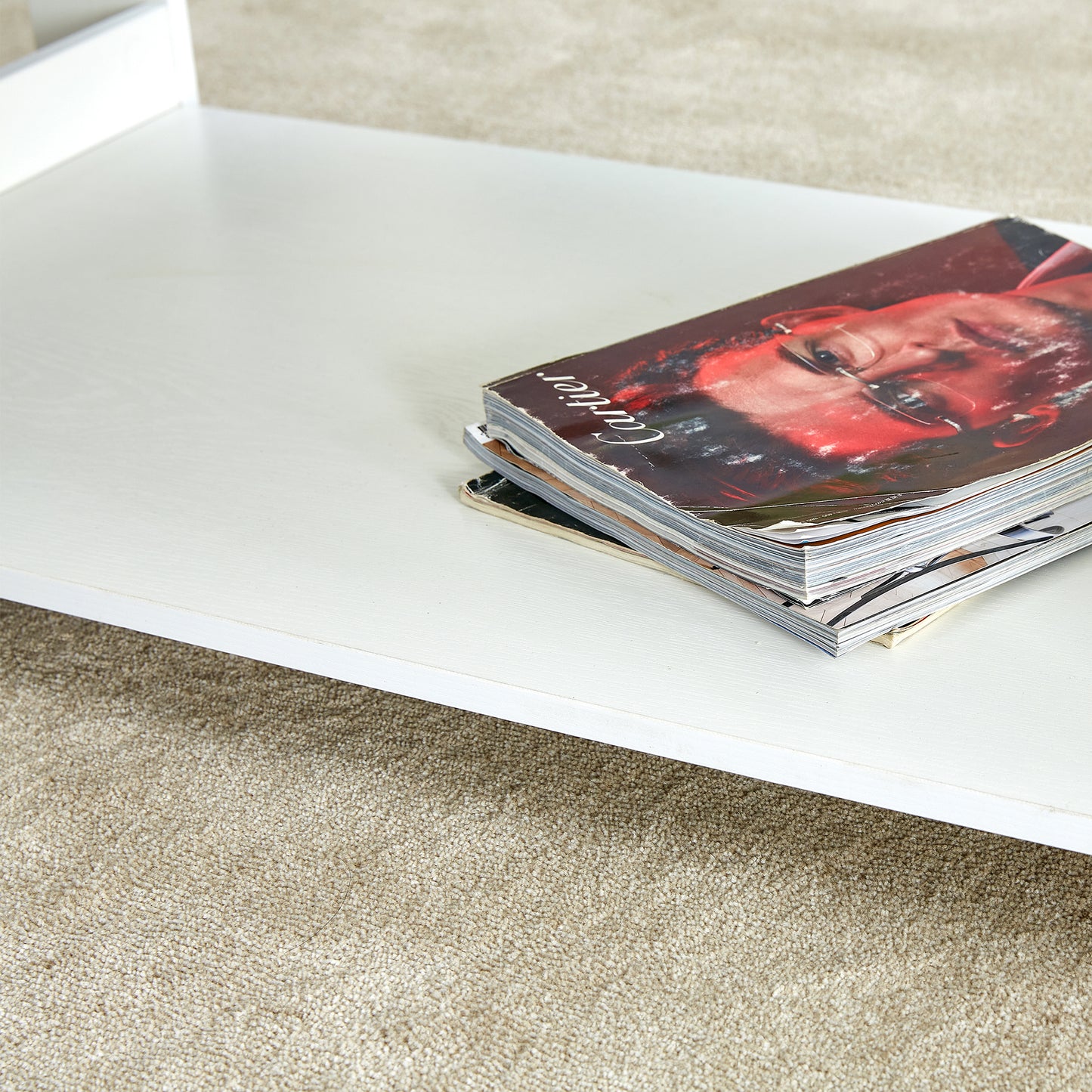 A modern and practical white coffee table. The double layered coffee table is made of MDF material,. Suitable for living room, bedroom, and study.CT-16