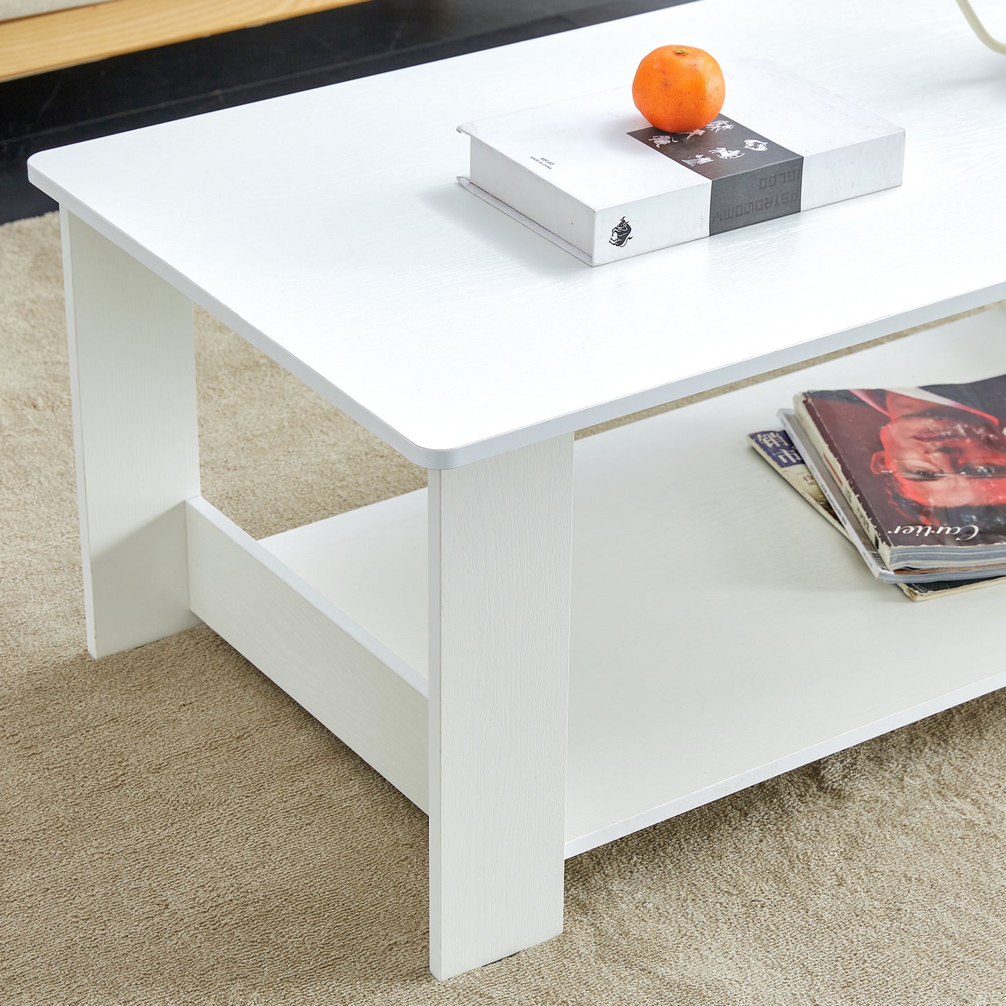 A modern and practical white coffee table. The double layered coffee table is made of MDF material,. Suitable for living room, bedroom, and study.CT-16