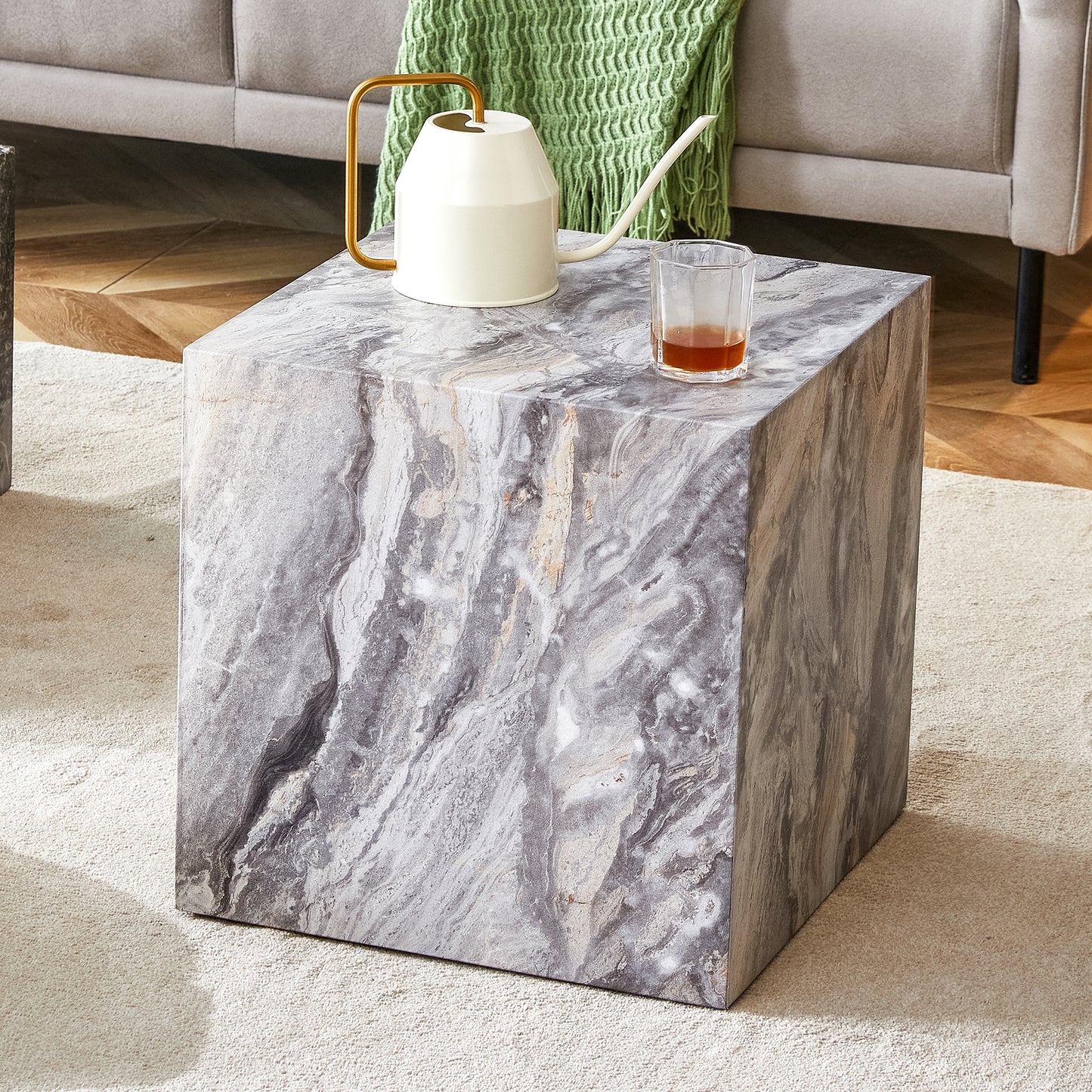 Elevate your living space with this modern MDF coffee table, which showcases gray textured patterns. It is characterized by stylish design.