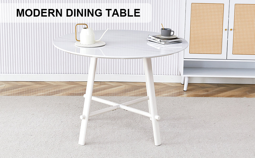 A modern minimalist circular dining table with a 42 inch diameter white patterned tabletop and white metal legs. Suitable for restaurants, living rooms, and conference rooms.