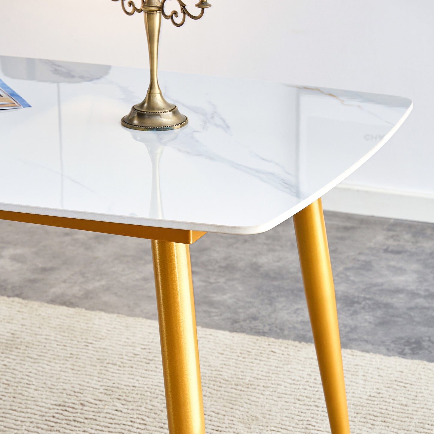 Modern minimalist dining table. White imitation marble patterned stone burning tabletop with golden metal legs. 50 "* 30" * 30 "F-001