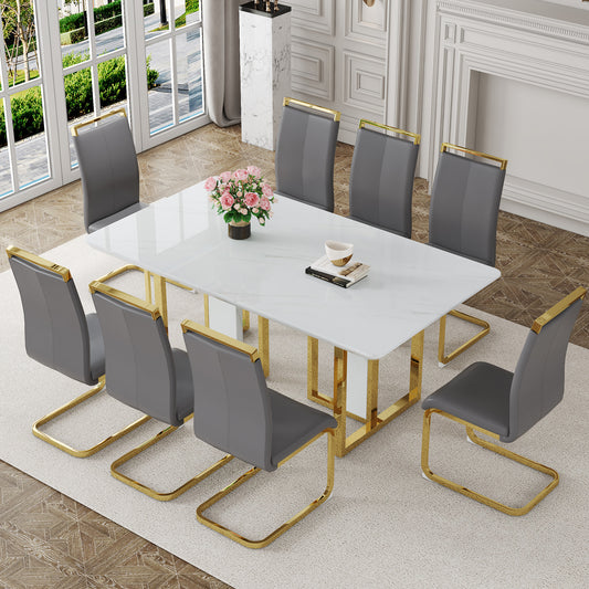 Table and chair set.67"x36" White marble pattern MDF Dining Table Set with 8 Dark Gray PU Chairs.MDF sticker,White marble pattern sticker,Gold C-tube chair legs,Suitable for kitchen,Dining room,etc.