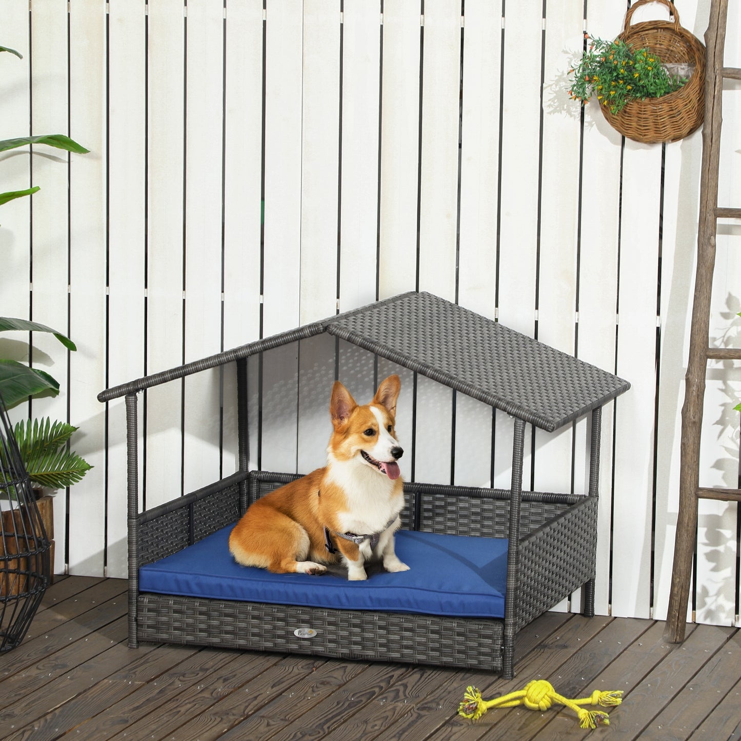 PawHut Wicker Dog House Outdoor with Canopy, Rattan Dog Bed with Water-resistant Cushion, for Small and Medium Dogs, Dark Blue