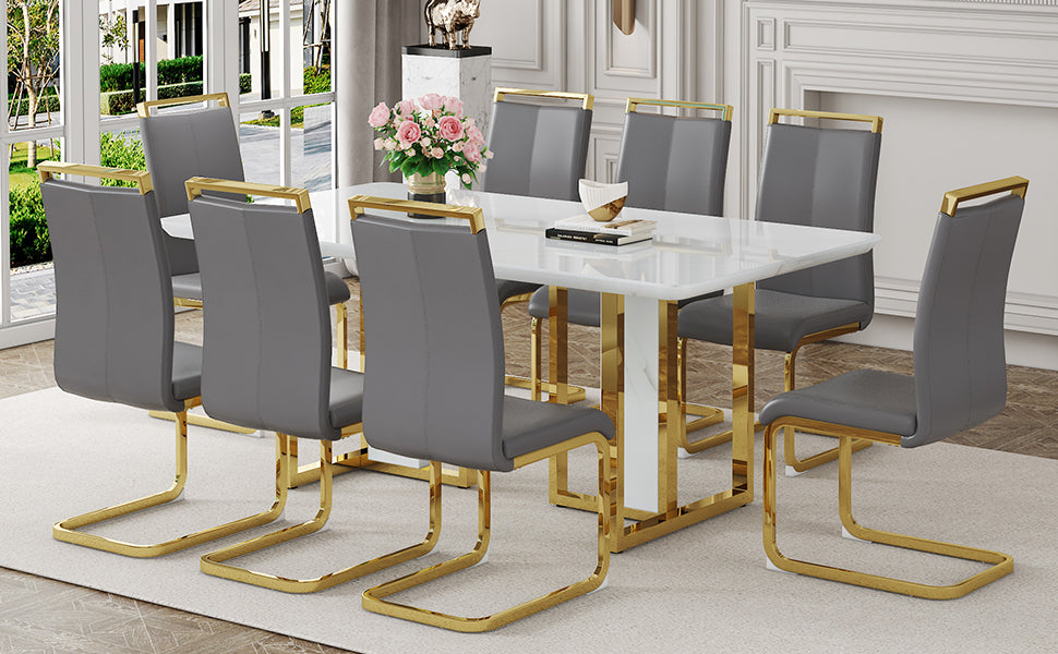 Table and chair set.67"x36" White marble pattern MDF Dining Table Set with 8 Dark Gray PU Chairs.MDF sticker,White marble pattern sticker,Gold C-tube chair legs,Suitable for kitchen,Dining room,etc.