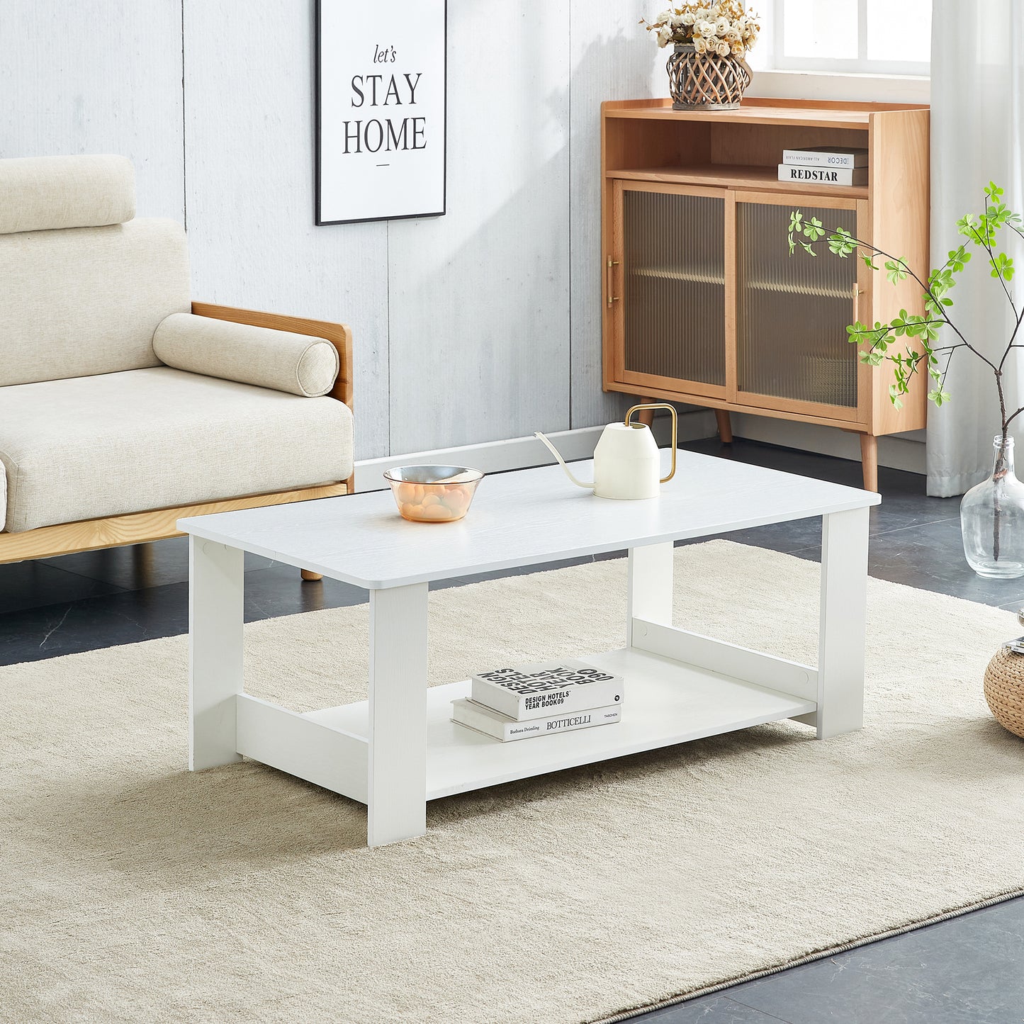 A modern and practical white coffee table. The double layered coffee table is made of MDF material,. Suitable for living room, bedroom, and study.CT-16