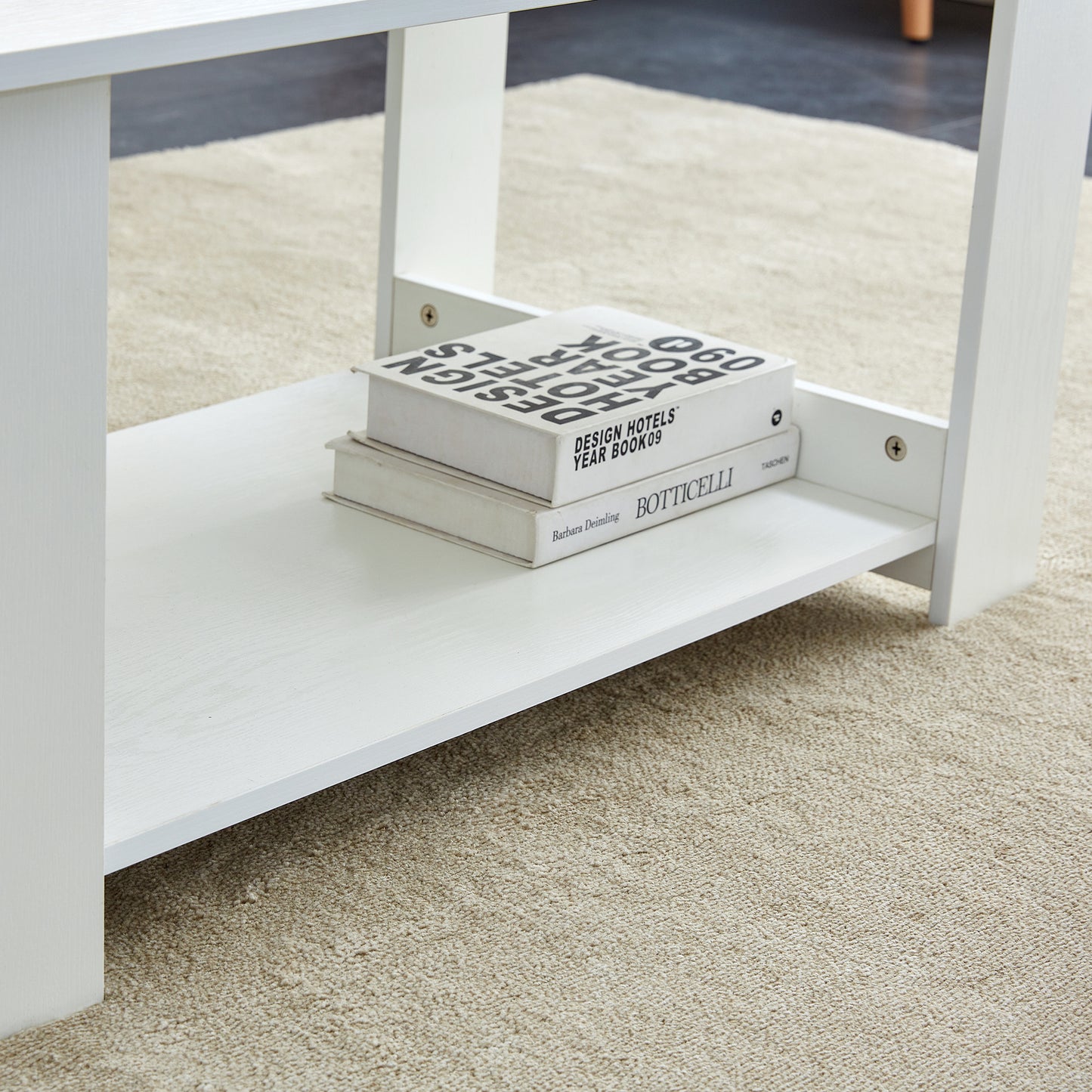 A modern and practical white coffee table. The double layered coffee table is made of MDF material,. Suitable for living room, bedroom, and study. CT-16