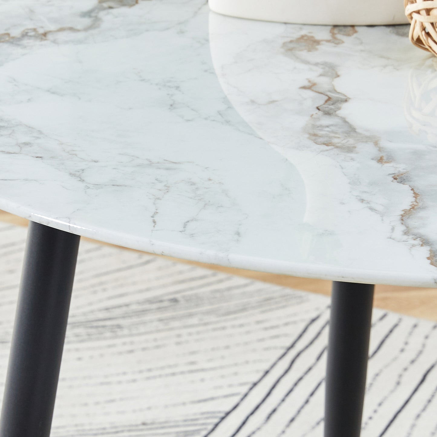 A modern minimalist circular dining table with a diameter of 40 inches, a 0.3 inch thick imitation marble pattern tabletop and black metal legs  40 '* 40' * 30 'DT-1164